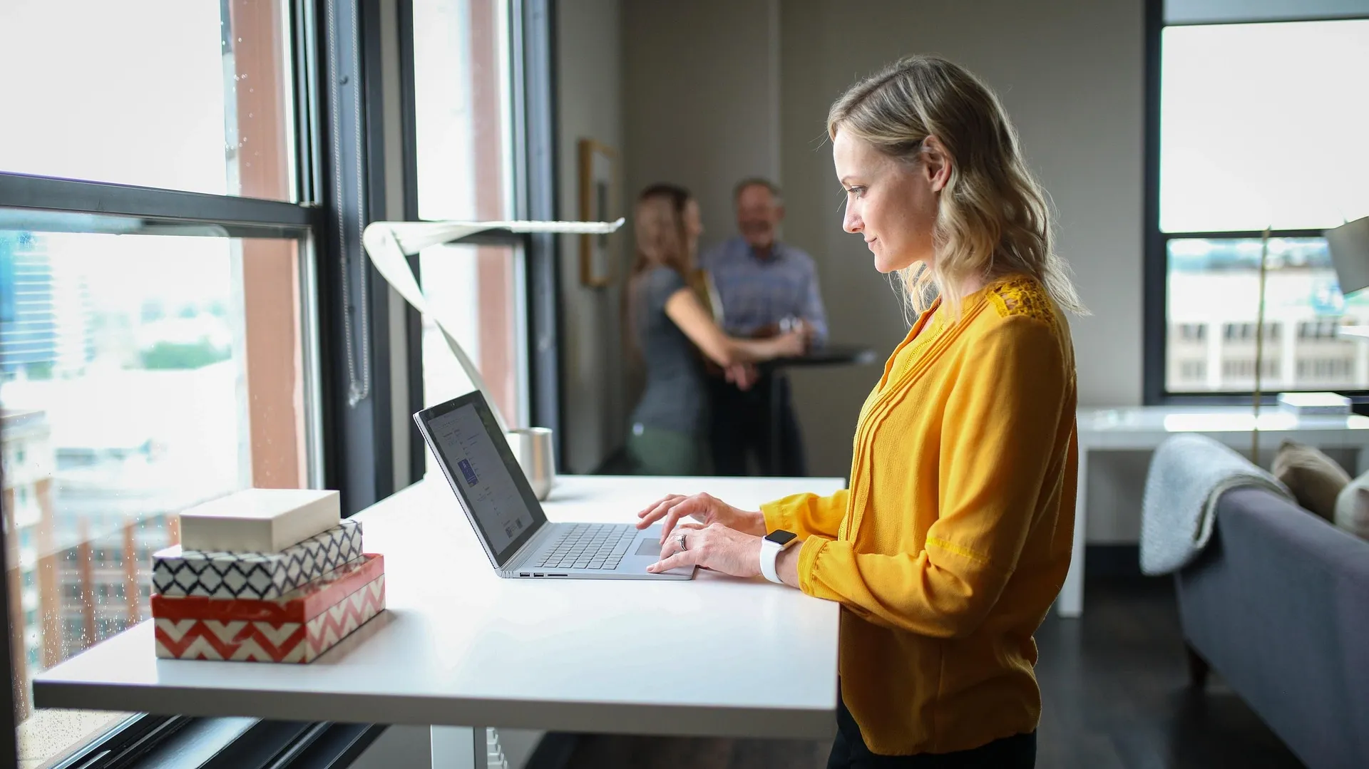 Woman working at a standing desk