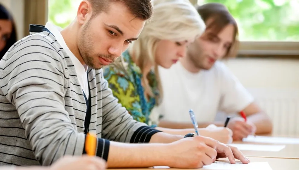 College-student-copying-test-cropped